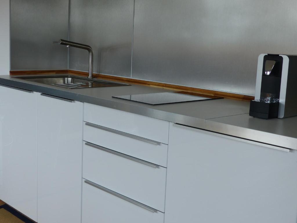 Kuchyň nebo kuchyňský kout v ubytování Truchtling Appartements