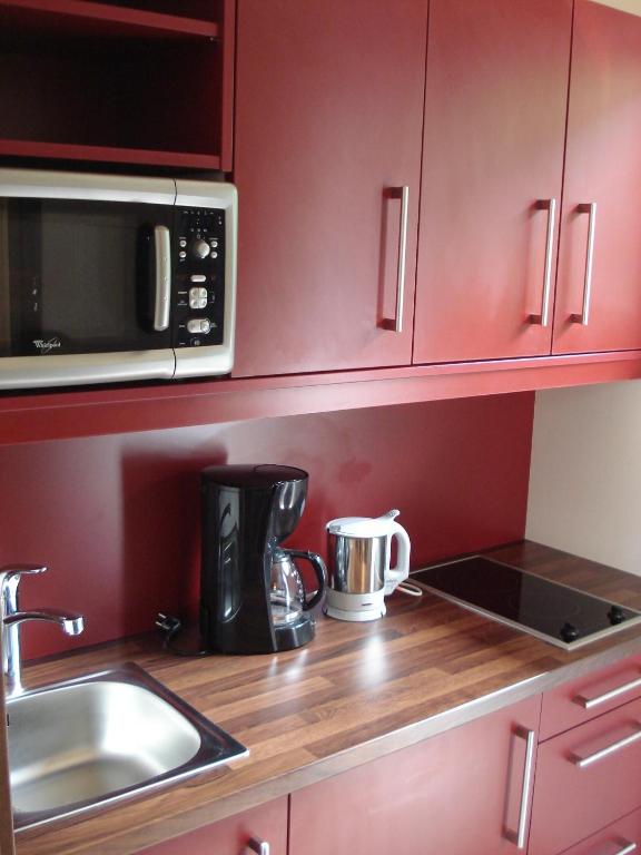Kuchyň nebo kuchyňský kout v ubytování Hotel Apartment Das Au- Gut