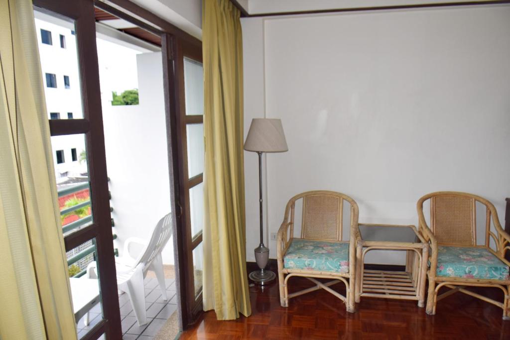 Posezení v ubytování Puangpen Villa Hotel