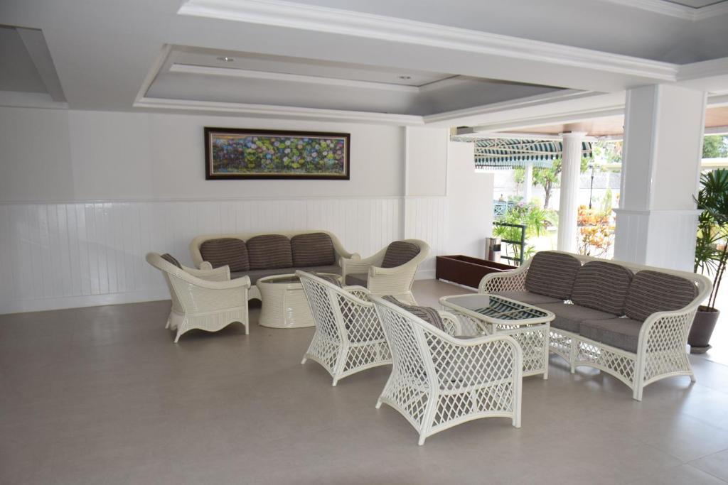 Posezení v ubytování Puangpen Villa Hotel
