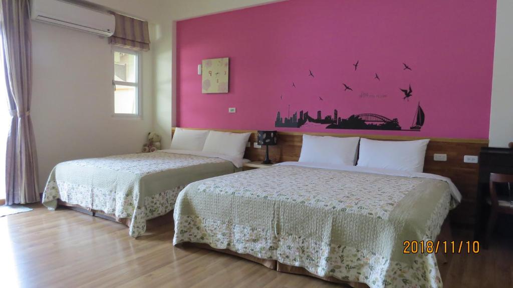 Postel nebo postele na pokoji v ubytování 2013 Homestay