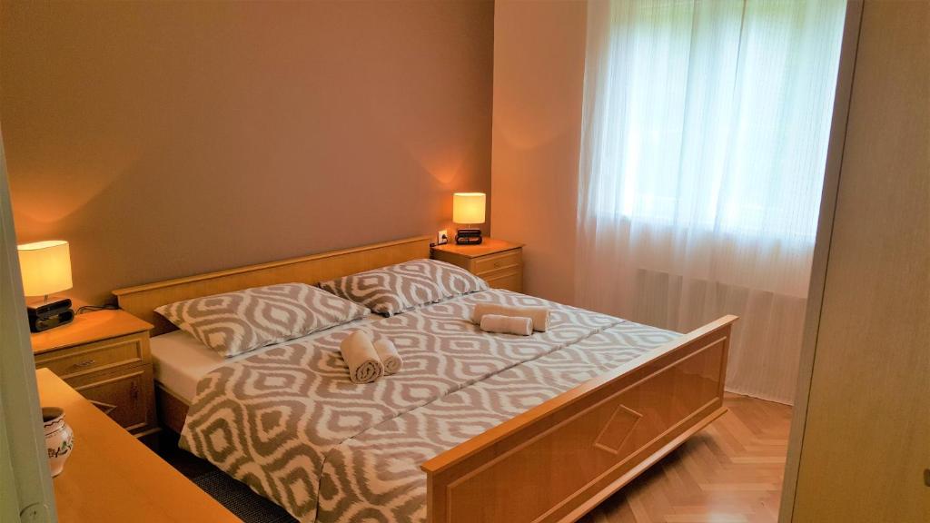 Postel nebo postele na pokoji v ubytování Apartments Come&Stay