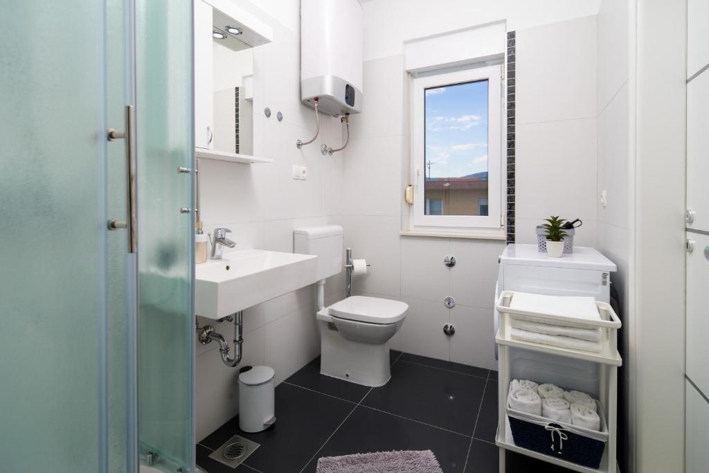 Kúpeľňa v ubytovaní Lotus Apartman