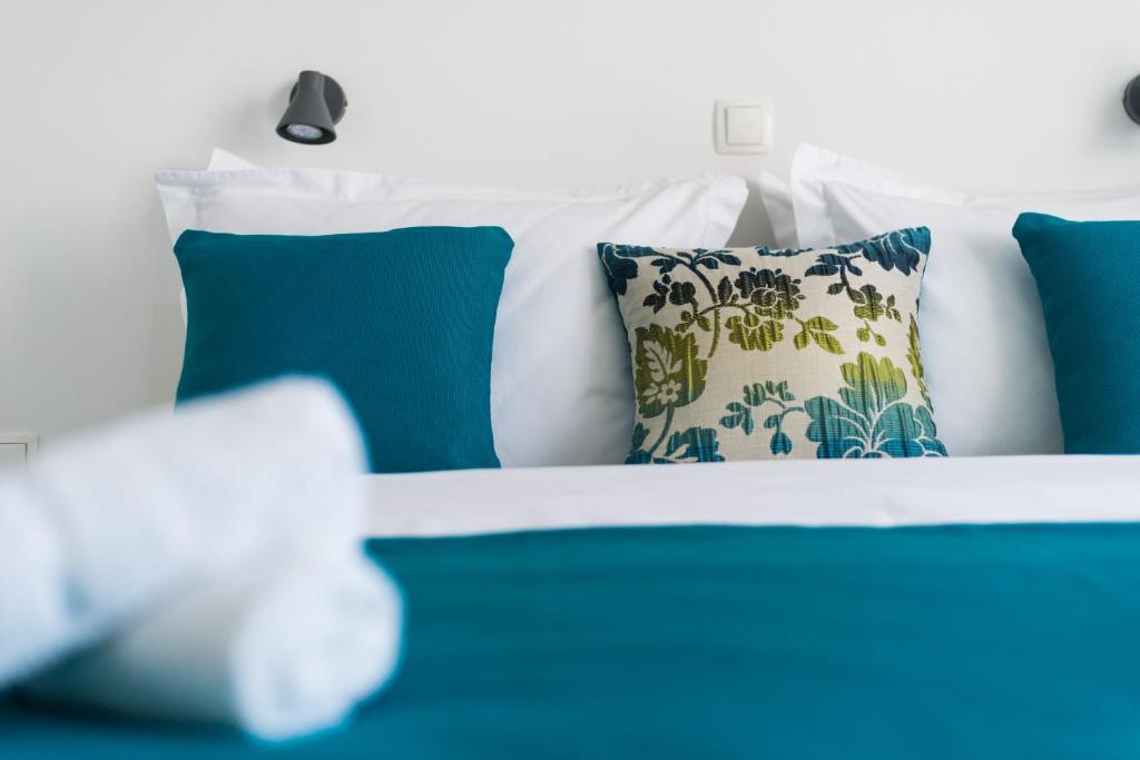 Posteľ alebo postele v izbe v ubytovaní Lotus Apartman