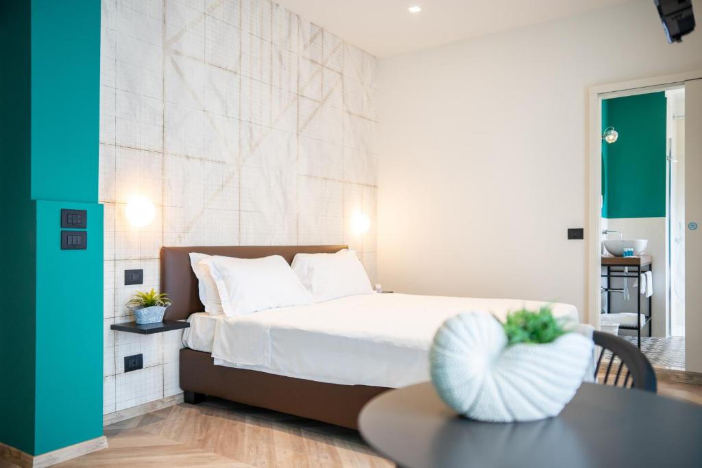 Postel nebo postele na pokoji v ubytování B&B Isabella