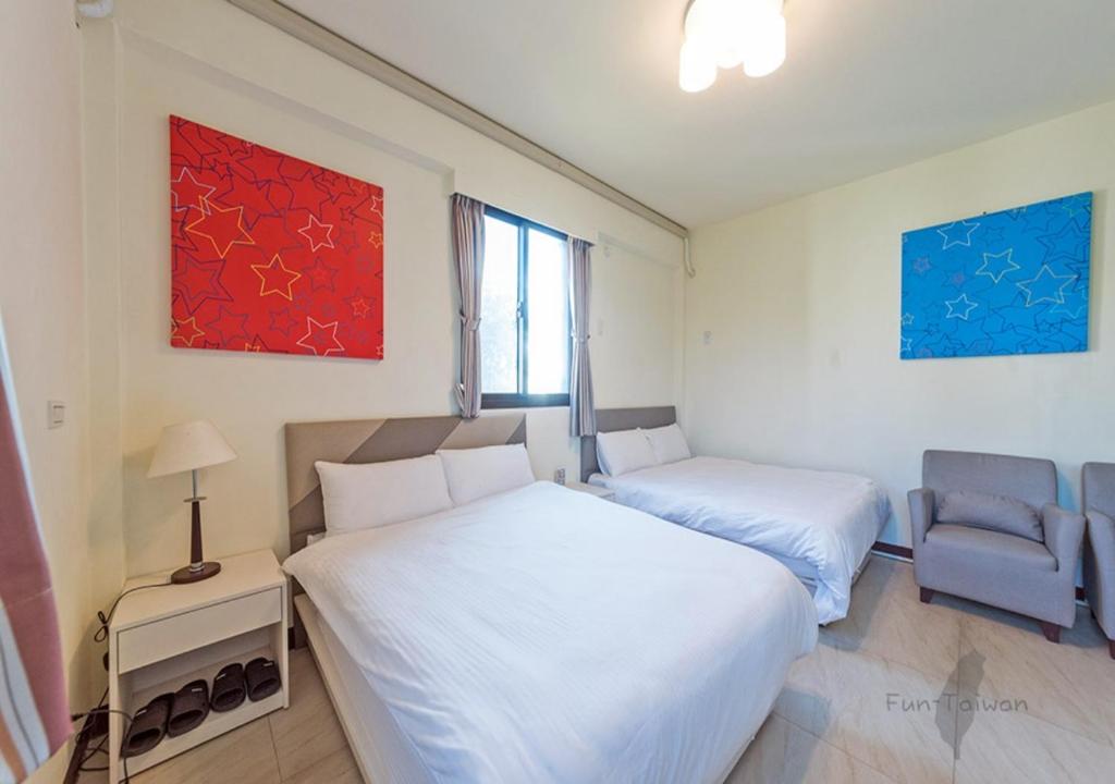 Postel nebo postele na pokoji v ubytování Kinmen Line In Bed and Breakfast
