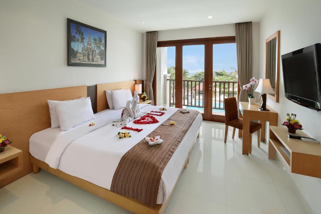 Giường trong phòng chung tại Bali Relaxing Resort and Spa