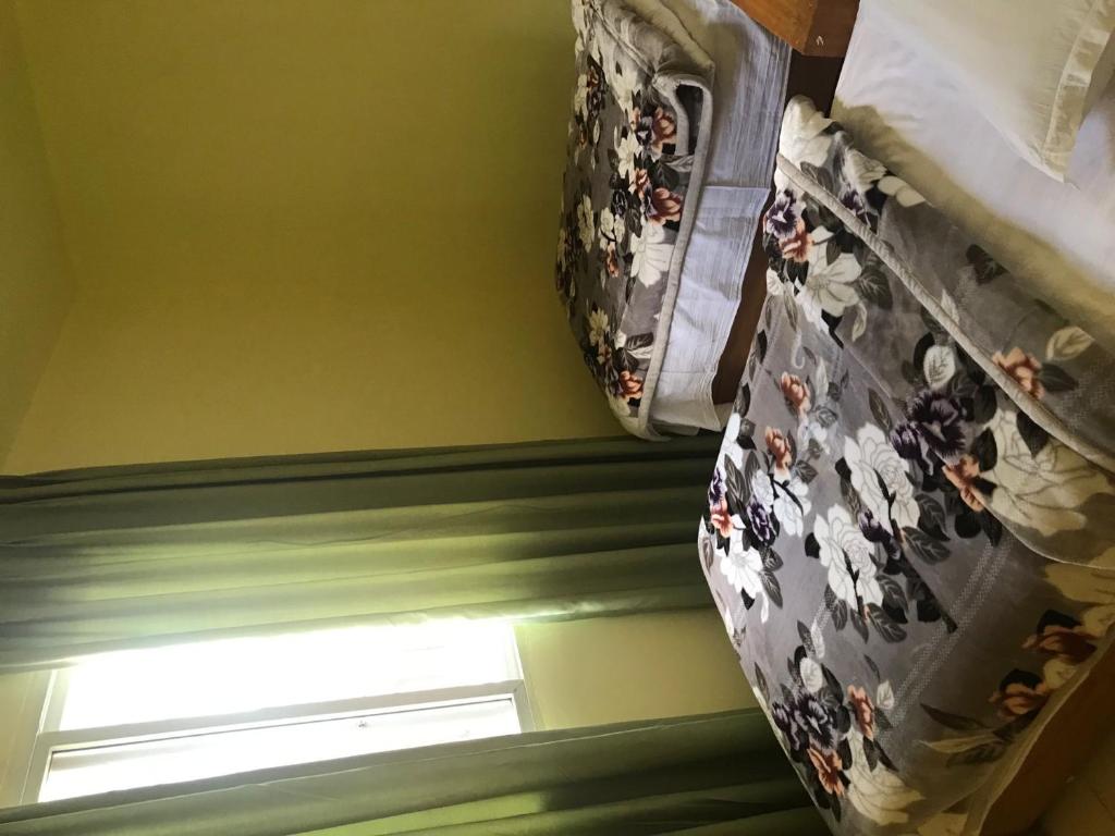 Postel nebo postele na pokoji v ubytování Youranju Guesthouse