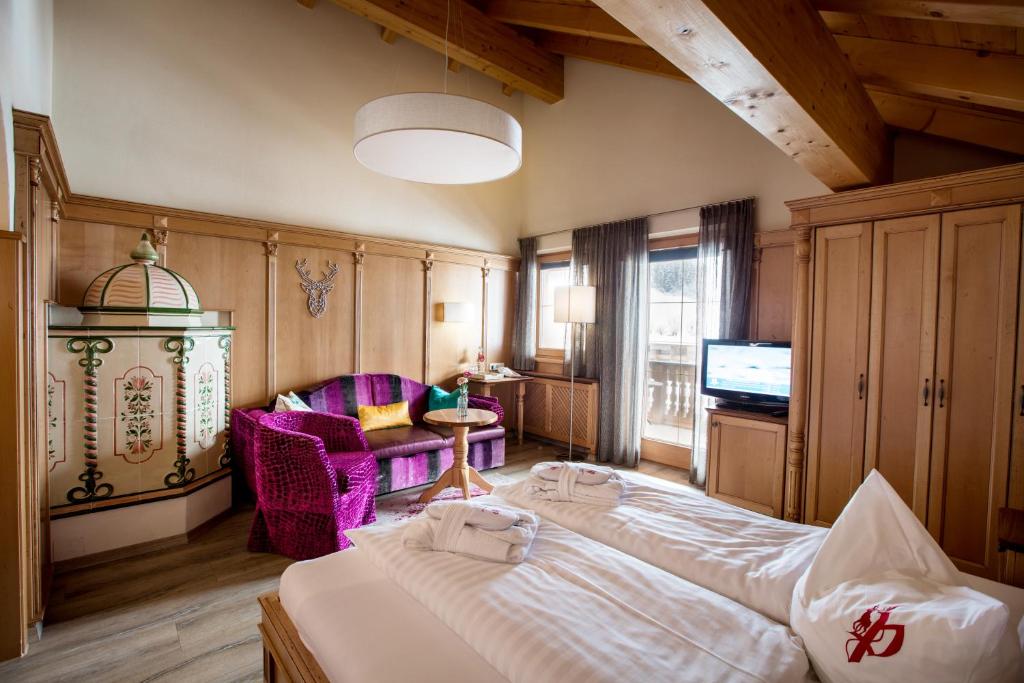 Posteľ alebo postele v izbe v ubytovaní Hotel Gasthof Perauer