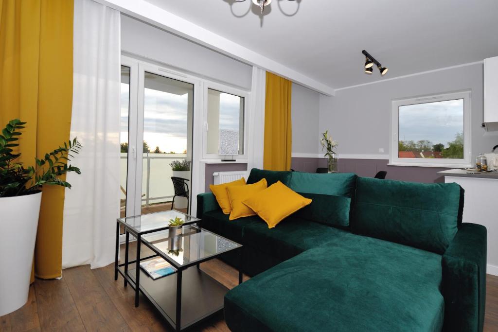 Posedenie v ubytovaní Apartament RESORT Chełmońskiego Śrem