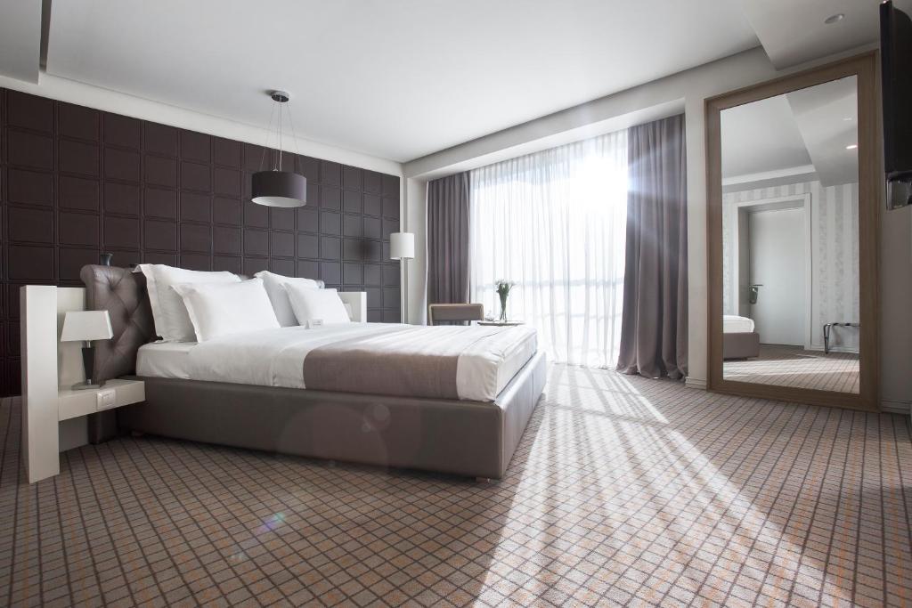 Ένα ή περισσότερα κρεβάτια σε δωμάτιο στο Jump INN Hotel Belgrade