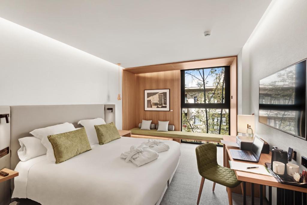Postel nebo postele na pokoji v ubytování Protur Naisa Palma Hotel