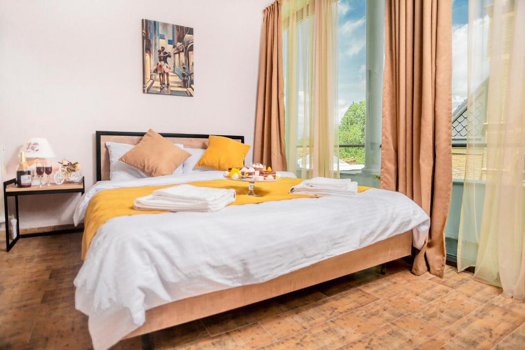 Postel nebo postele na pokoji v ubytování Diuma Hotel