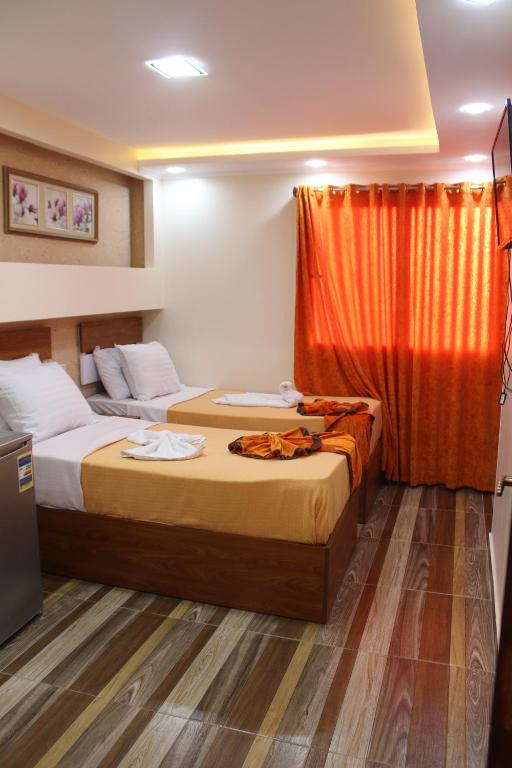 Postel nebo postele na pokoji v ubytování Osiris Hotel Cairo