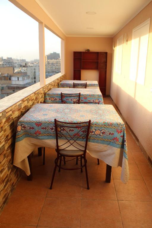 Postel nebo postele na pokoji v ubytování Osiris Hotel Cairo