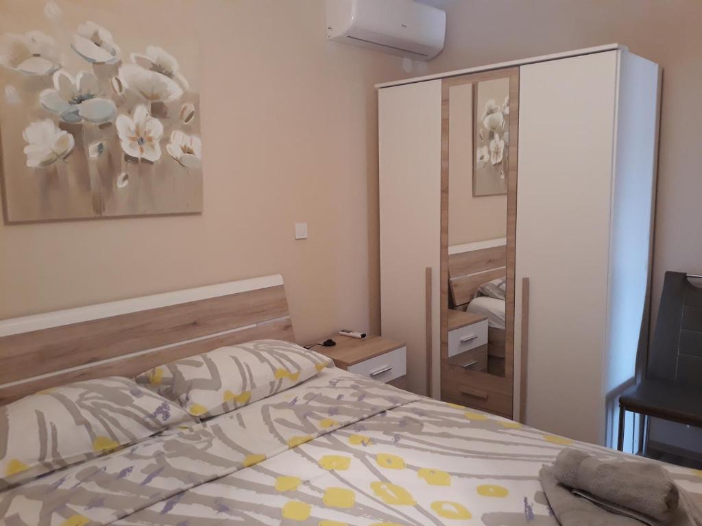 Posteľ alebo postele v izbe v ubytovaní Apartments Juliet