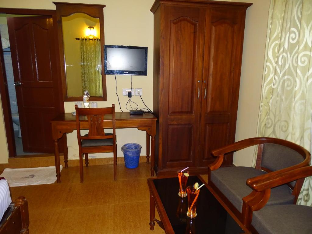 TV a/nebo společenská místnost v ubytování Sealine Beach Resorts