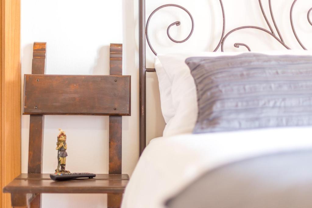 Posteľ alebo postele v izbe v ubytovaní Guest House Casa del Folletto