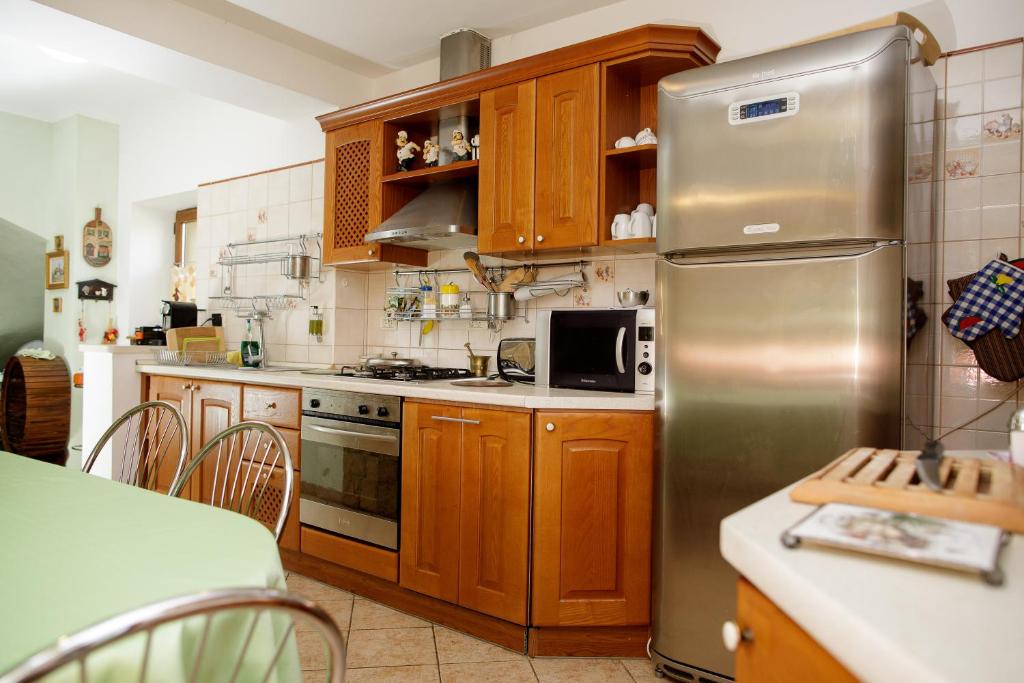 Kuchyň nebo kuchyňský kout v ubytování Zaivan Retreat
