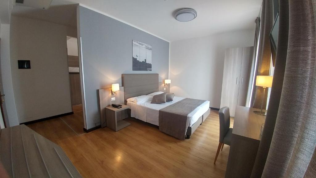 Postel nebo postele na pokoji v ubytování Hotel Loreley