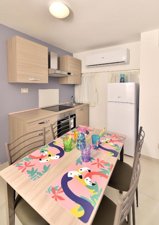 Kuchyň nebo kuchyňský kout v ubytování Hotel Croce Del Sud
