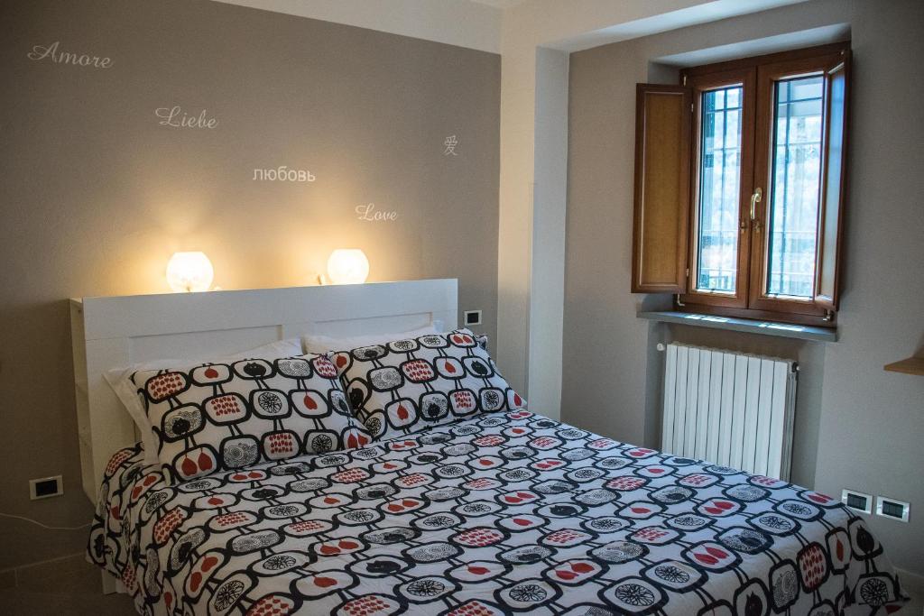 Postel nebo postele na pokoji v ubytování Podere Scoglio d'Oro