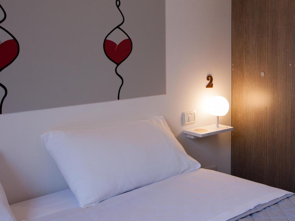 Posteľ alebo postele v izbe v ubytovaní Lobby Collective Hostel - Lecce