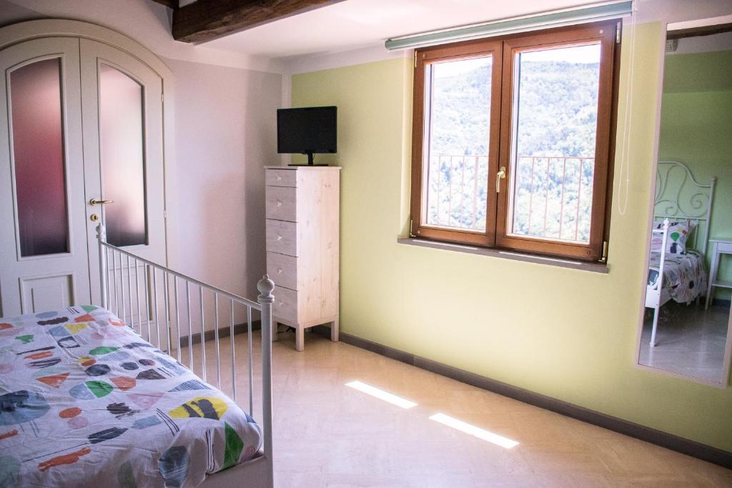 Postel nebo postele na pokoji v ubytování Podere Scoglio d'Oro