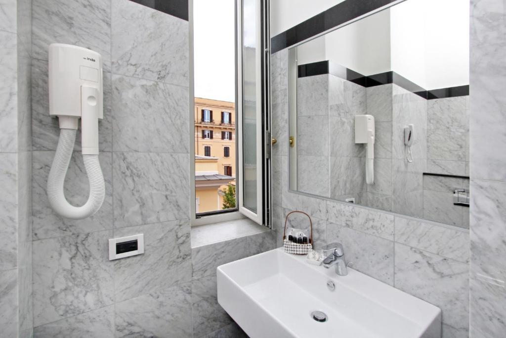 Koupelna v ubytování Hotel Arcangelo