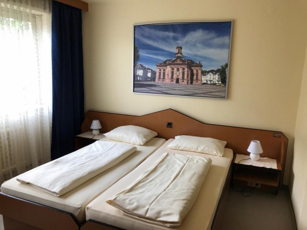Postel nebo postele na pokoji v ubytování City-Hotel Kaiserhof