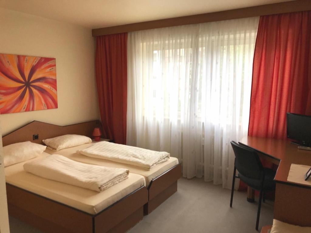 Postel nebo postele na pokoji v ubytování City-Hotel Kaiserhof