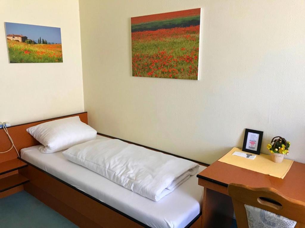 Postel nebo postele na pokoji v ubytování City-Hotel Kaiserhof