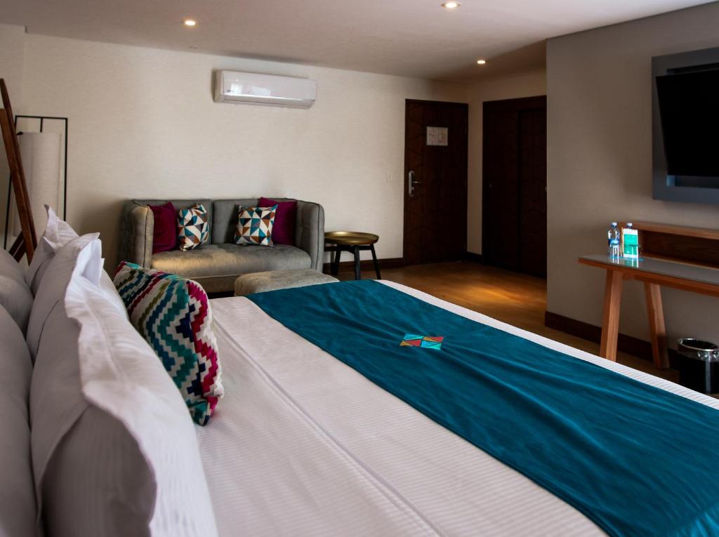 TV a/nebo společenská místnost v ubytování FCH Hotel Providencia