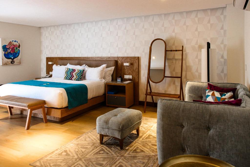 Postel nebo postele na pokoji v ubytování FCH Hotel Providencia