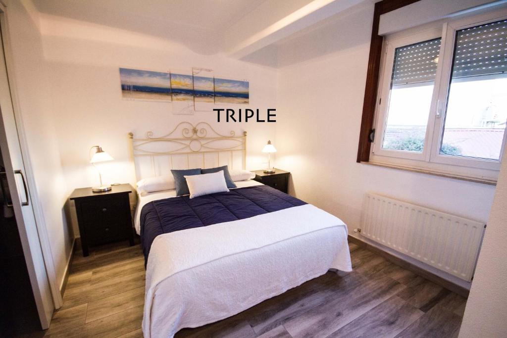 Postel nebo postele na pokoji v ubytování Hotel Ria de Bilbao