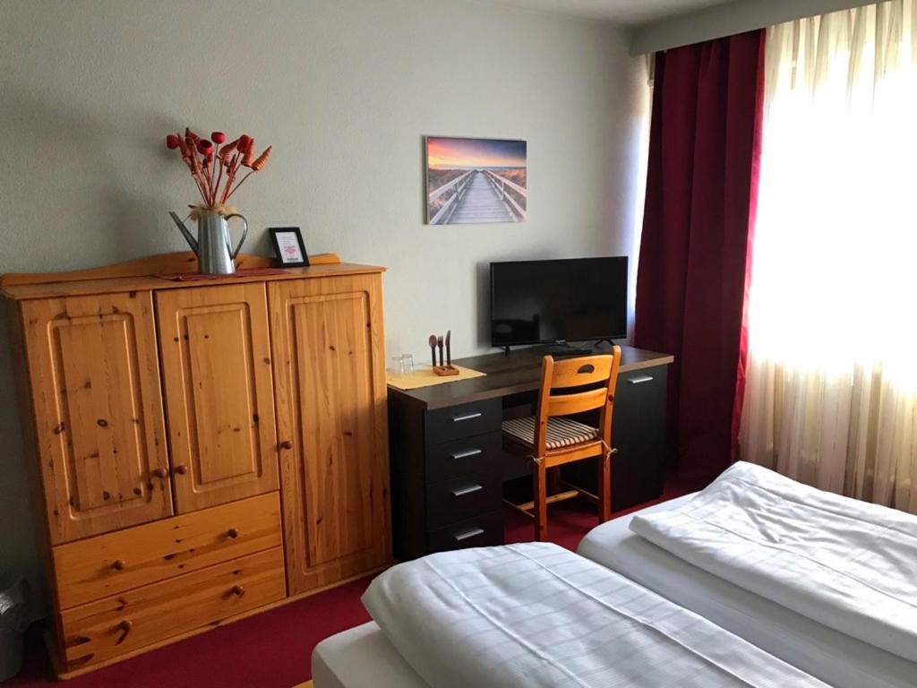 TV a/nebo společenská místnost v ubytování City-Hotel Kaiserhof