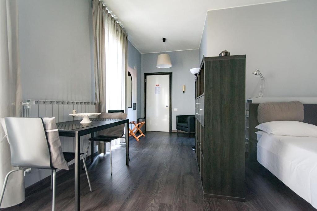 Posteľ alebo postele v izbe v ubytovaní Via Mentana 32 - The House Of Travelers