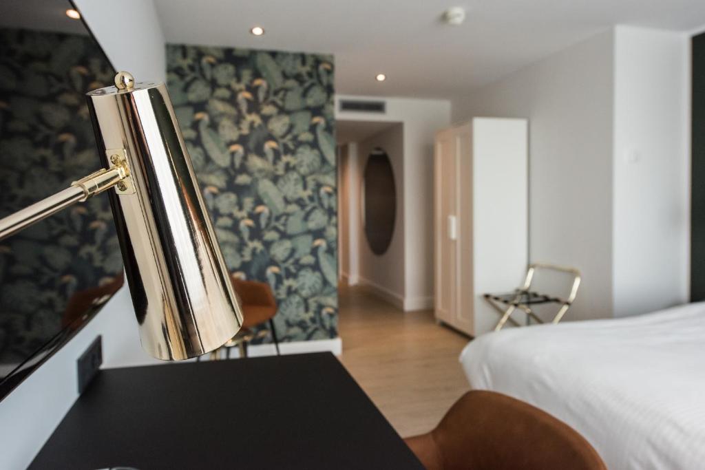 Postel nebo postele na pokoji v ubytování Van der Valk Hotel Melle - Osnabrück