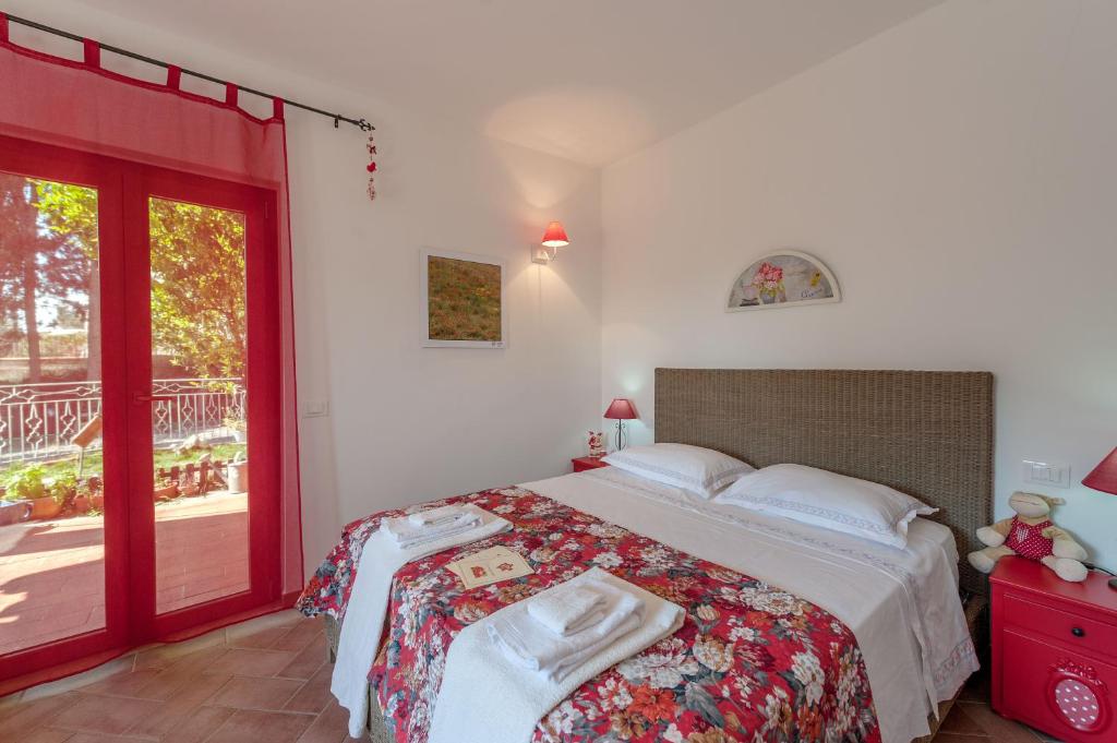 Uma cama ou camas num quarto em Le Tartarughe rooms