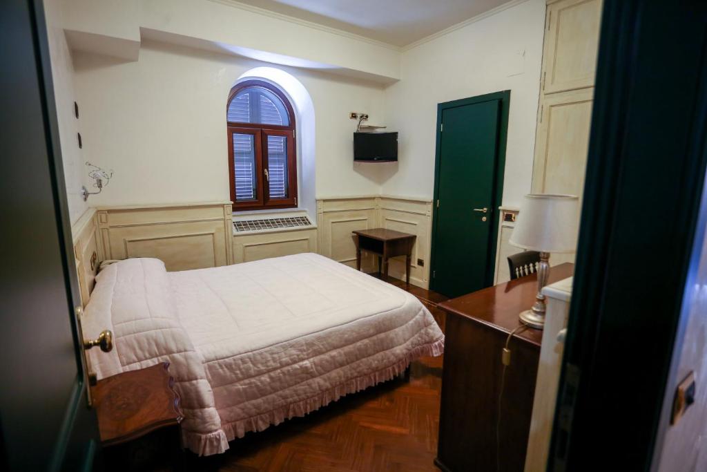 Postel nebo postele na pokoji v ubytování Olimpus