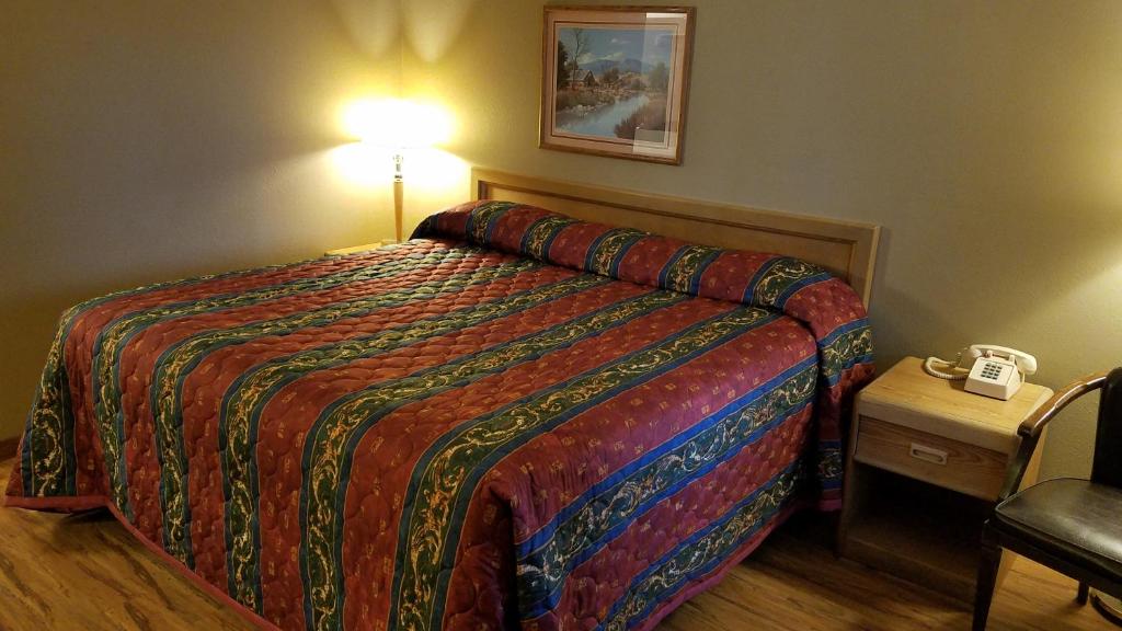 Postel nebo postele na pokoji v ubytování Royal Motor Inn