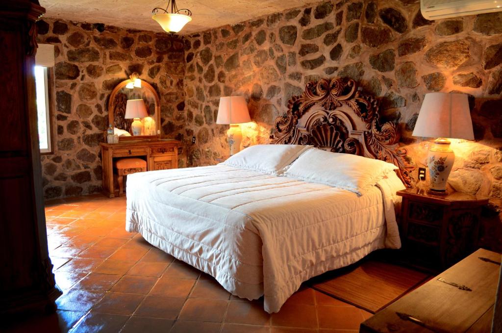 Postel nebo postele na pokoji v ubytování Posada de la Aldea