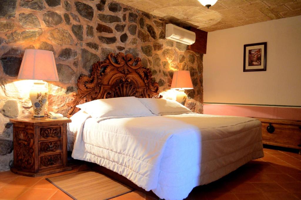 Postel nebo postele na pokoji v ubytování Posada de la Aldea