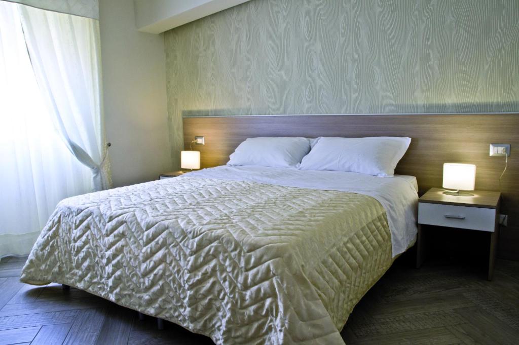 Postel nebo postele na pokoji v ubytování B&B Albachiara