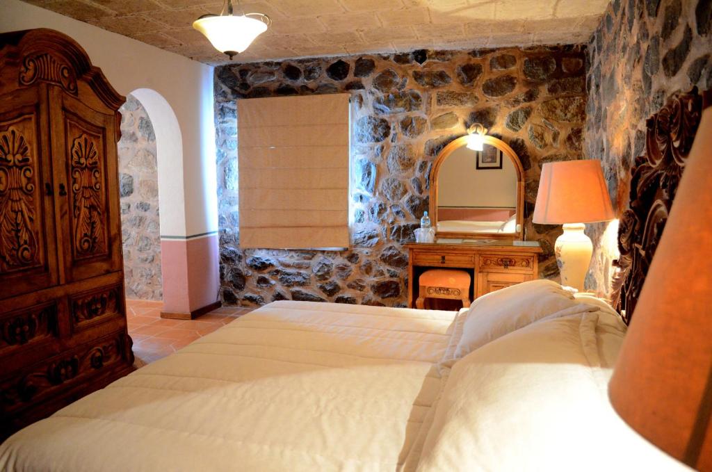 Postel nebo postele na pokoji v ubytování Posada de la Aldea