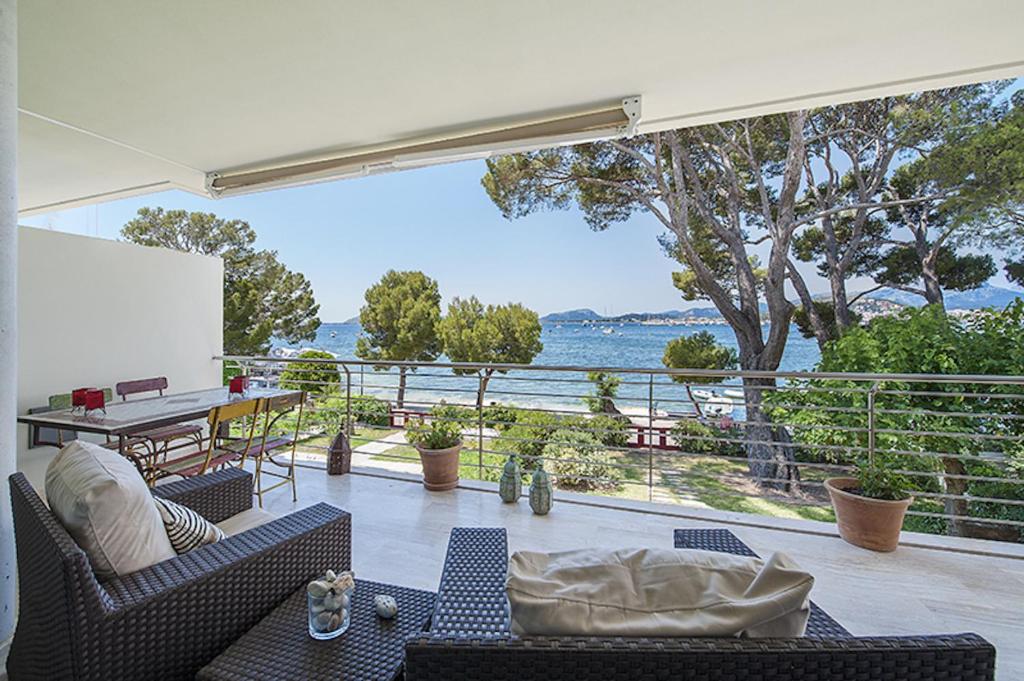 a living room with a view of the water at Apartment Vora Dor in Port de Pollensa