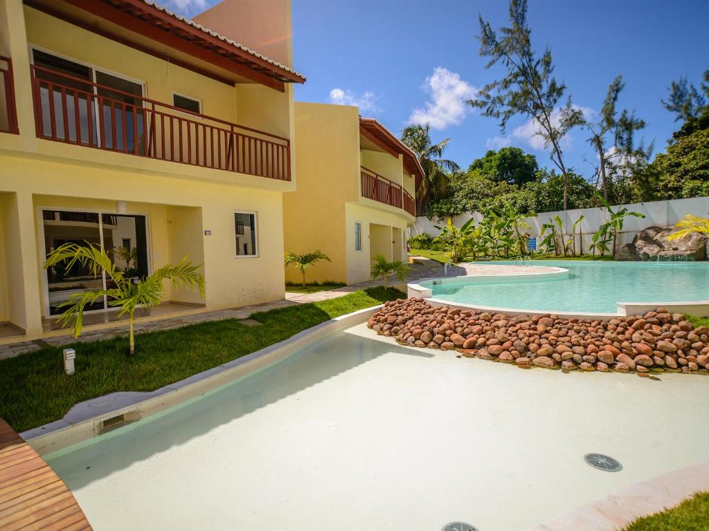  Flat completo e bem localizado no Solar Água Pipa por Carpediem