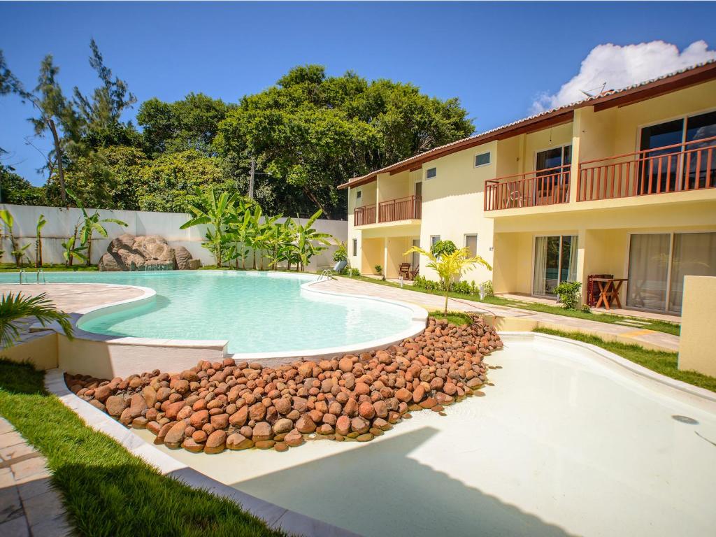  Flat completo e bem localizado no Solar Água Pipa por Carpediem