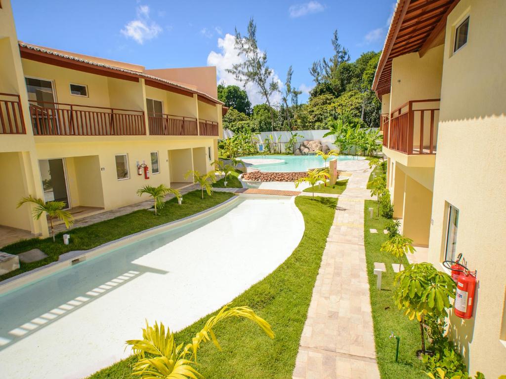  Flat completo e bem localizado no Solar Água Pipa por Carpediem