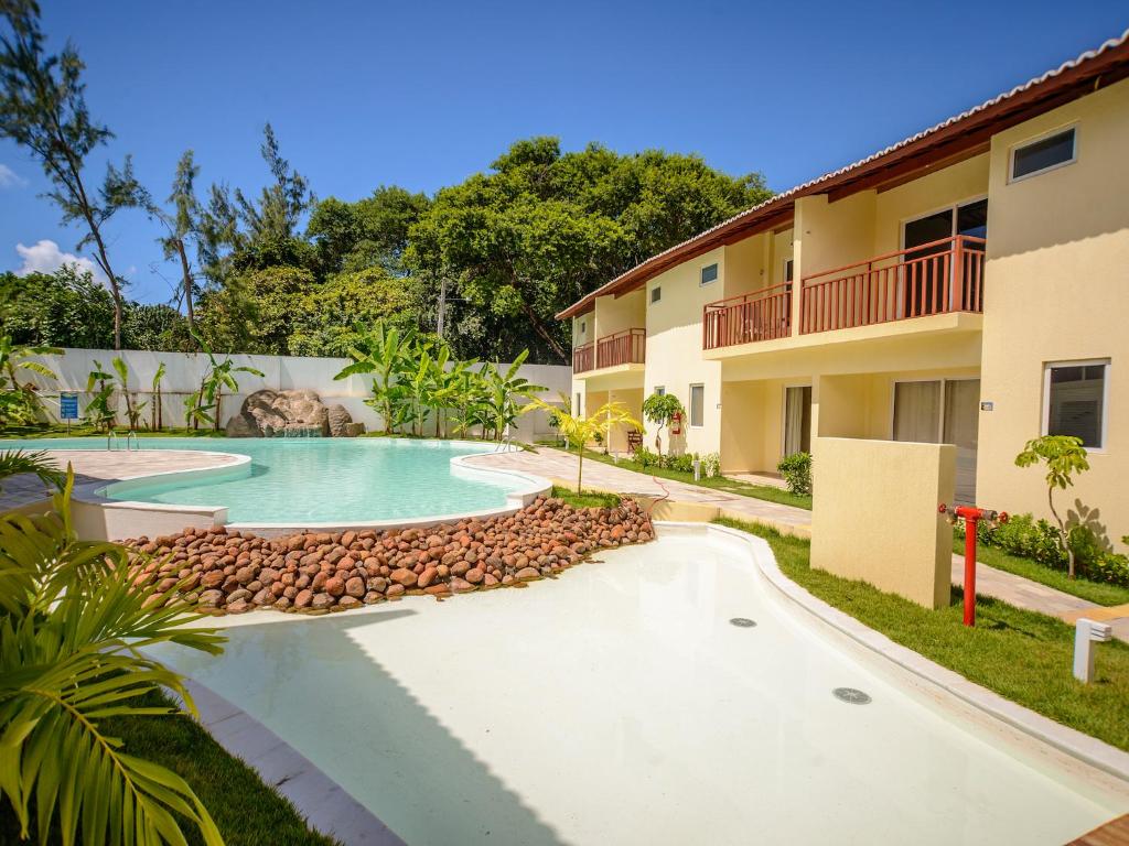  Flat completo e bem localizado no Solar Água Pipa por Carpediem